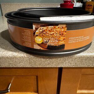 Set of three springform pans, never used, 8, 10, 12 inch pans